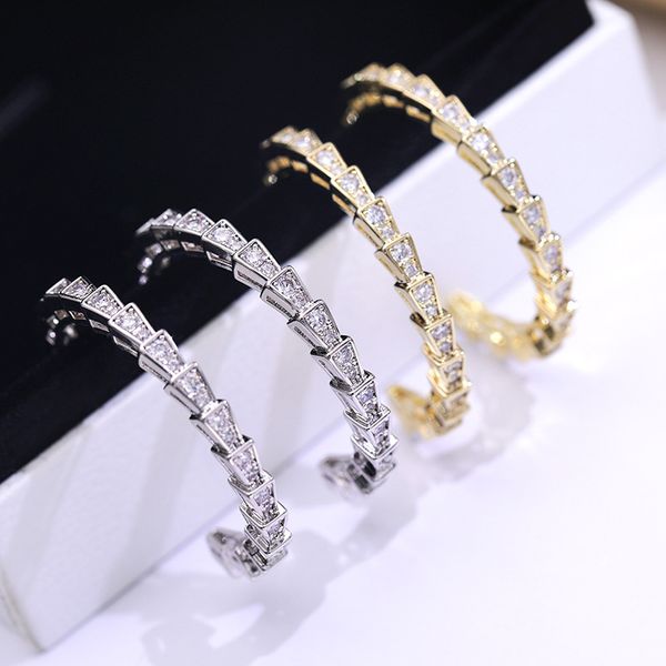 european and american s925 silver needle diaphragm zircon serpentine large ear earrings are cold, simple, concise and novel, Golden;silver
european and american s925 silver needle diaphragm zircon serpentine large ear earrings are cold, simple, concise and novel, Golden;silver