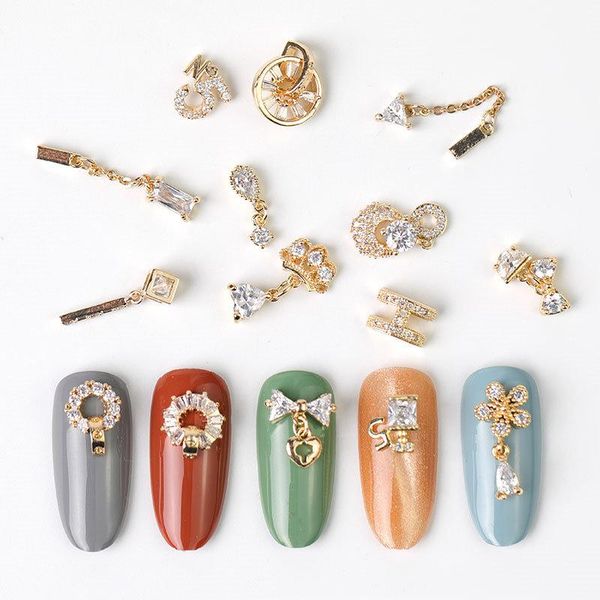 nail art decorations 10pcs/lot pendant/ring/chain 3d alloy zircon gold metal manicure accessories for diy charms, Silver;gold
nail art decorations 10pcs/lot pendant/ring/chain 3d alloy zircon gold metal manicure accessories for diy charms, Silver;gold