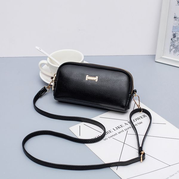 shell autumn and summer new style messenger women's small bag chaohan handbag open letter mobile phone wallet, Red;black 
shell autumn and summer new style messenger women's small bag chaohan handbag open letter mobile phone wallet, Red;black