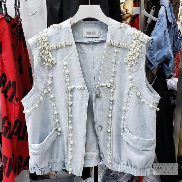 casaco feminino beading pearls vest women's waistcoat 2020 new sleeveless vest heavy industry beaded loose short women, Black;white
casaco feminino beading pearls vest women's waistcoat 2020 new sleeveless vest heavy industry beaded loose short women, Black;white