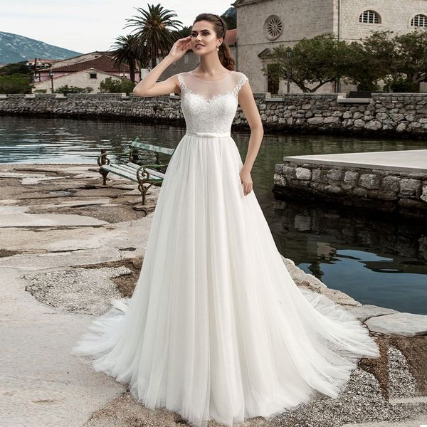 2021 new tulle bridal gown cap sleeve o neck lace applique a line wedding es white ivory robe de mariage ioq6
2021 new tulle bridal gown cap sleeve o neck lace applique a line wedding es white ivory robe de mariage ioq6