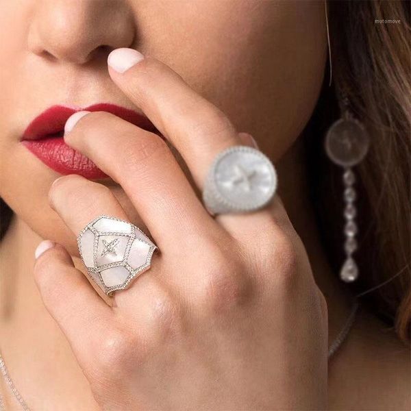 925 sterling silver cubic zirconia star round badge ring with mother of pearl women may collection jewelry1, Golden;silver
925 sterling silver cubic zirconia star round badge ring with mother of pearl women may collection jewelry1, Golden;silver
