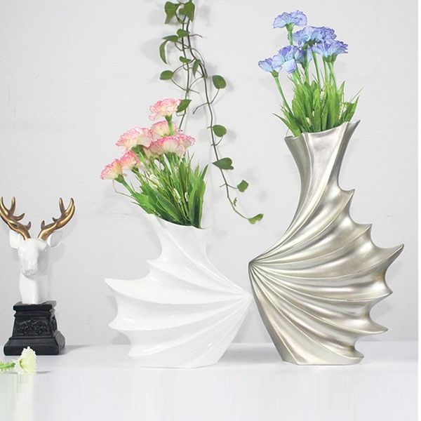 modern simple abstraction geometry resin vase creative living room coffee table deskflower arrangement vase x4907
modern simple abstraction geometry resin vase creative living room coffee table deskflower arrangement vase x4907