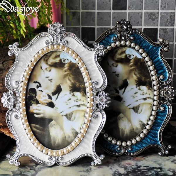frames european vintage luxury pearl metal po frame picture oval classical creative set table home deskwedding decoration
frames european vintage luxury pearl metal po frame picture oval classical creative set table home deskwedding decoration