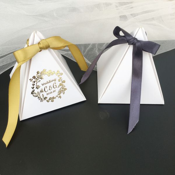 wedding candy box favors gifts boxes personalized white paper pymaid design for party decorations
wedding candy box favors gifts boxes personalized white paper pymaid design for party decorations