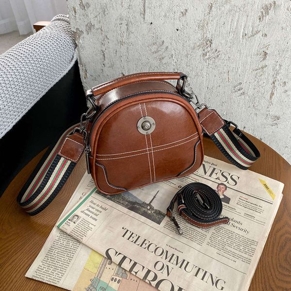 luxurys designers 2021 new fashion mini round versatile portable messenger women's bag
luxurys designers 2021 new fashion mini round versatile portable messenger women's bag