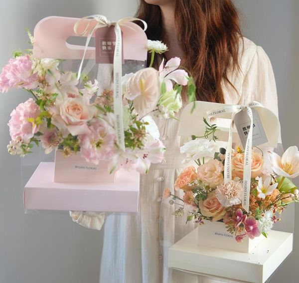 transparent clear flower packaging bag with handle bouquet gift paper boxes for wedding valentine's day sn1854
transparent clear flower packaging bag with handle bouquet gift paper boxes for wedding valentine's day sn1854