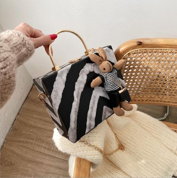 Factory wholesale women handbag cute cartoon pendant women hard box chain bag new zebra leather handbag street trend leather shoulder bag
Factory wholesale women handbag cute cartoon pendant women hard box chain bag new zebra leather handbag street trend leather shoulder bag