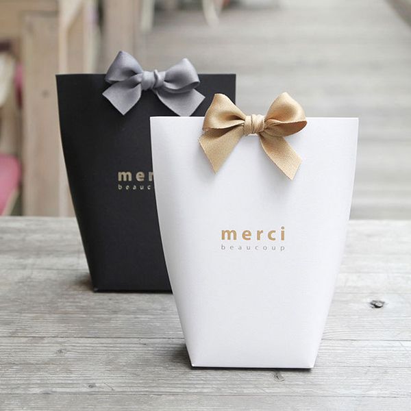 5pcs upscale black white bronzing "merci" candy french thank you wedding gift box package birthday party favors bags q1218
5pcs upscale black white bronzing "merci" candy french thank you wedding gift box package birthday party favors bags q1218