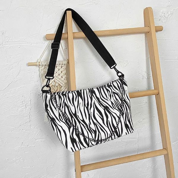 ladies fashion casual canvas material large capacity handbags temperament black and white stripes messenger shoulder bags
ladies fashion casual canvas material large capacity handbags temperament black and white stripes messenger shoulder bags