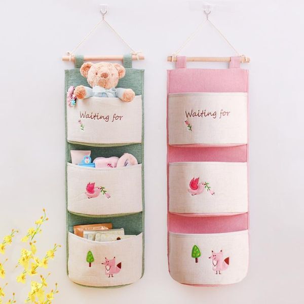 large capacity hanging pockets hanging organizer wall-mounted fabric door storage bag 3 pockets hanger organiser1
large capacity hanging pockets hanging organizer wall-mounted fabric door storage bag 3 pockets hanger organiser1