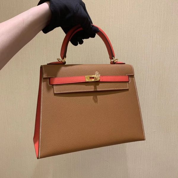 wholesale half handmade customized brand bag25cm brown with pink colors epsom leather wax line stitching gold and silver hardware by order
wholesale half handmade customized brand bag25cm brown with pink colors epsom leather wax line stitching gold and silver hardware by order