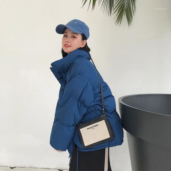 korean style 2021 winter jacket women stand collar solid black white female coat loose oversized womens short parka1
korean style 2021 winter jacket women stand collar solid black white female coat loose oversized womens short parka1