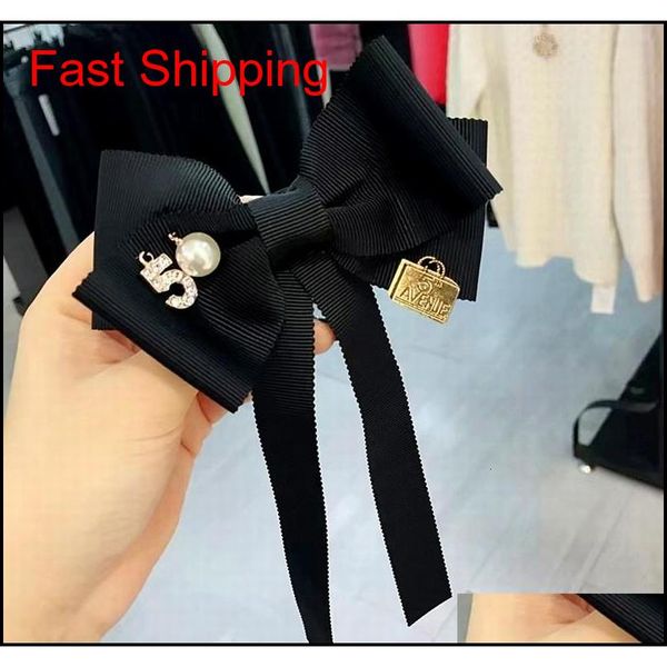 simple korean girl college style sweet tassel big bow tie brooch for women fashion suit cloth shirt qylare homes2007, Black;gray 
simple korean girl college style sweet tassel big bow tie brooch for women fashion suit cloth shirt qylare homes2007, Black;gray