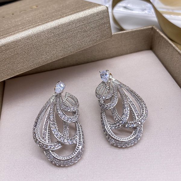 simple bow ribbon inlaid with full diamonds before earrings, european and american heavy industry drop-shaped holiday ladies, Silver
simple bow ribbon inlaid with full diamonds before earrings, european and american heavy industry drop-shaped holiday ladies, Silver