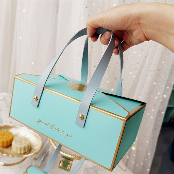 high-grade bronzing protable paper box leather portable rope chocolate candy packaging birthday party new year gift box
high-grade bronzing protable paper box leather portable rope chocolate candy packaging birthday party new year gift box
