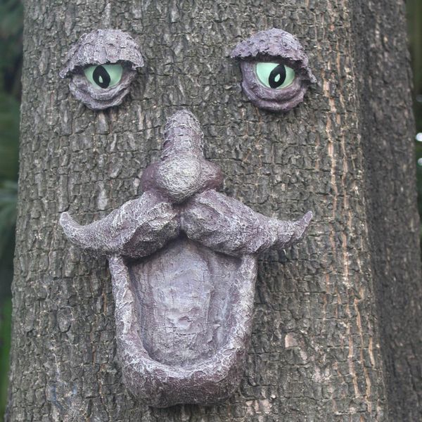 wild bird feeder tree face and big eye feeder whimsical tree hugger sculpture outdoor & garden decor
wild bird feeder tree face and big eye feeder whimsical tree hugger sculpture outdoor & garden decor