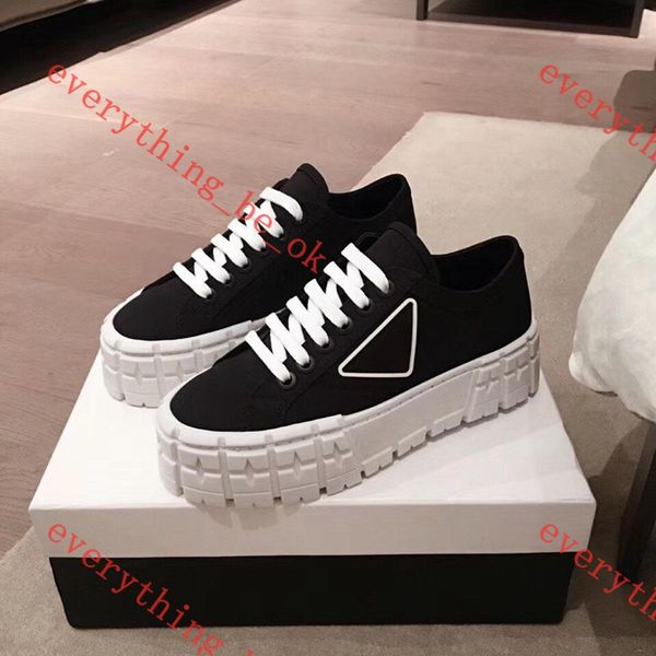 rubber platform inspired by motocross tires defines the unusual design of these nylon gabardine sneakers. the logo triangle decorated
rubber platform inspired by motocross tires defines the unusual design of these nylon gabardine sneakers. the logo triangle decorated