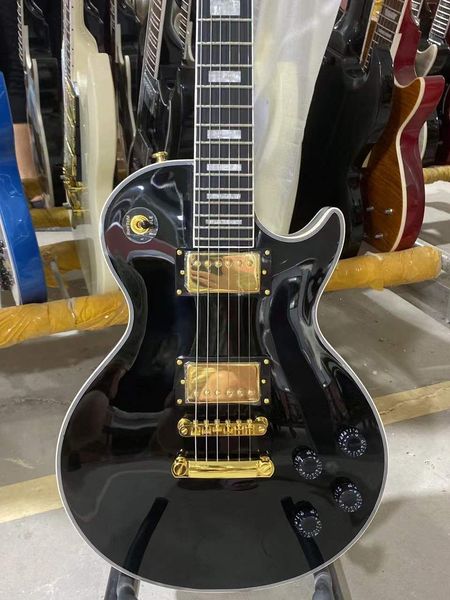black custom electric guitar gold hardware mahpgany body ebony fingerboard guitar
black custom electric guitar gold hardware mahpgany body ebony fingerboard guitar