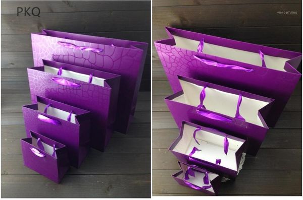 24pcs/lot purple paper present box for pajamas clothes books packaging handle paper bags kraft gift bag1
24pcs/lot purple paper present box for pajamas clothes books packaging handle paper bags kraft gift bag1