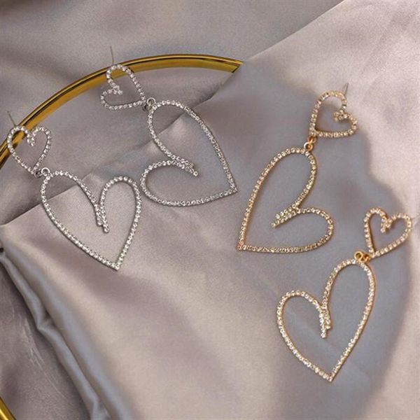 elegant exaggerated heart-shaped hanging dangle prevent allergy women earrings 2020 new trend rhinestone fashion stud earrings, Silver
elegant exaggerated heart-shaped hanging dangle prevent allergy women earrings 2020 new trend rhinestone fashion stud earrings, Silver