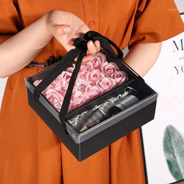 50pcs/lot packaging box wedding favors carton hand-held transparent pvc gift boxes creative folding flower packaging box1
50pcs/lot packaging box wedding favors carton hand-held transparent pvc gift boxes creative folding flower packaging box1