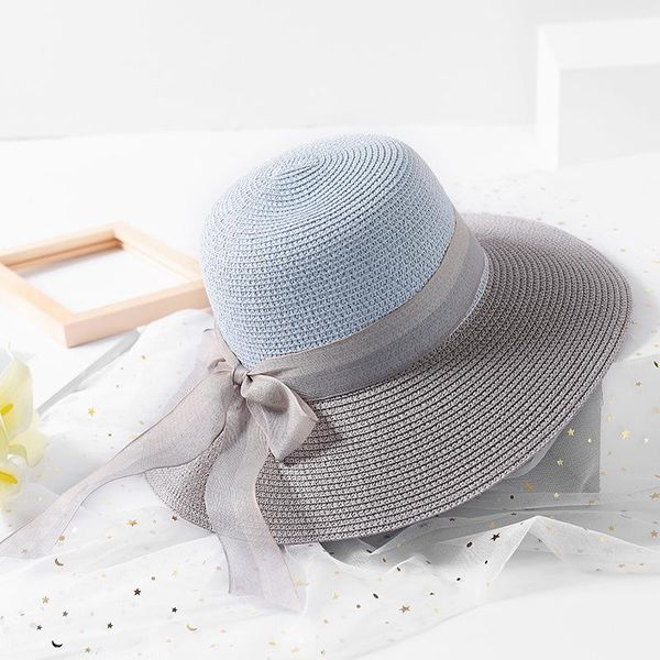 fashion wind two-color patchwork striped bowknot summer sun hat beautiful women straw beach hat large brimmed, Blue;gray
fashion wind two-color patchwork striped bowknot summer sun hat beautiful women straw beach hat large brimmed, Blue;gray