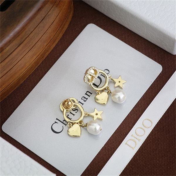 85% off factory clearance family pearl earrings female new peach heart love star front and back, Golden
85% off factory clearance family pearl earrings female new peach heart love star front and back, Golden