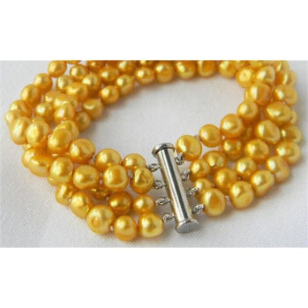 shipping>>>4strands 8'' golden baroque freshwater pearl bracelet free, Golden;silver 
shipping>>>4strands 8'' golden baroque freshwater pearl bracelet free, Golden;silver