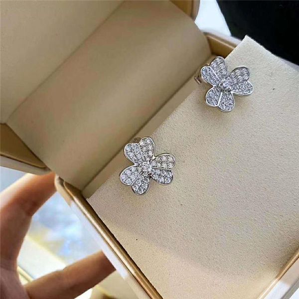 lucky clover stud earrings women shine cubic zirconia flower earrings korean catwalk jewelry z151, Golden;silver
lucky clover stud earrings women shine cubic zirconia flower earrings korean catwalk jewelry z151, Golden;silver