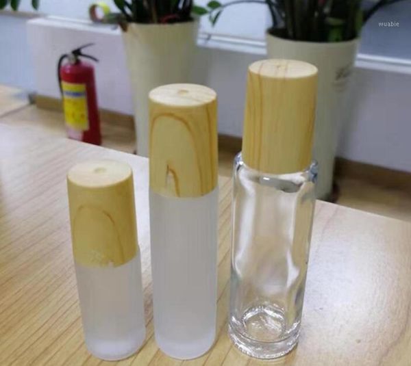 frosted clear glass roller bottles vials containers with metal roller ball and wood grain plastic cap for essential oil bottles#1
frosted clear glass roller bottles vials containers with metal roller ball and wood grain plastic cap for essential oil bottles#1
