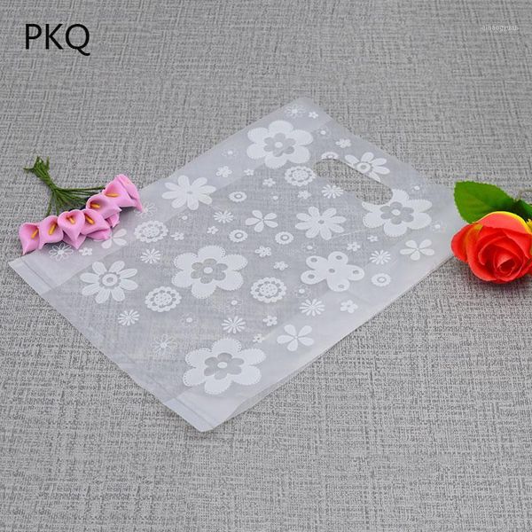 100pcs white flower printed plastic bag with handle transparent take away packaging bag party favor candy bags1
100pcs white flower printed plastic bag with handle transparent take away packaging bag party favor candy bags1