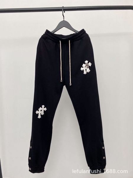 brand 20ch crohn black trousers front and back with leather cross embroidery, Black;white
brand 20ch crohn black trousers front and back with leather cross embroidery, Black;white