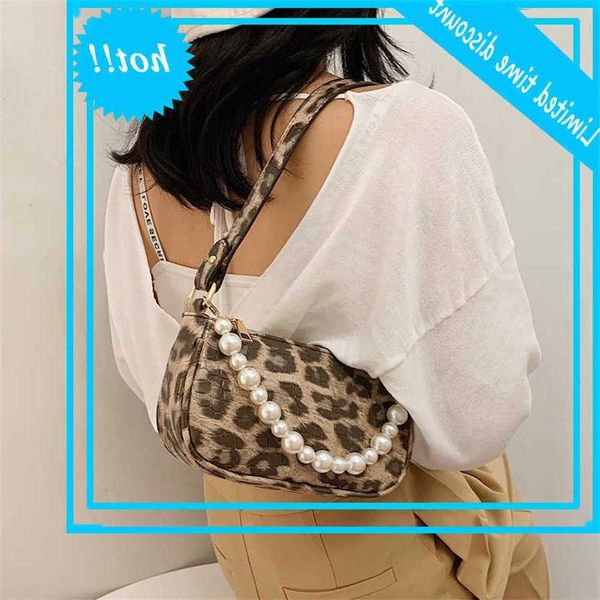 steen pattern pu learn luipaard arm bag for women pearl design small handbags and wallets lady travel fashion handbag
steen pattern pu learn luipaard arm bag for women pearl design small handbags and wallets lady travel fashion handbag
