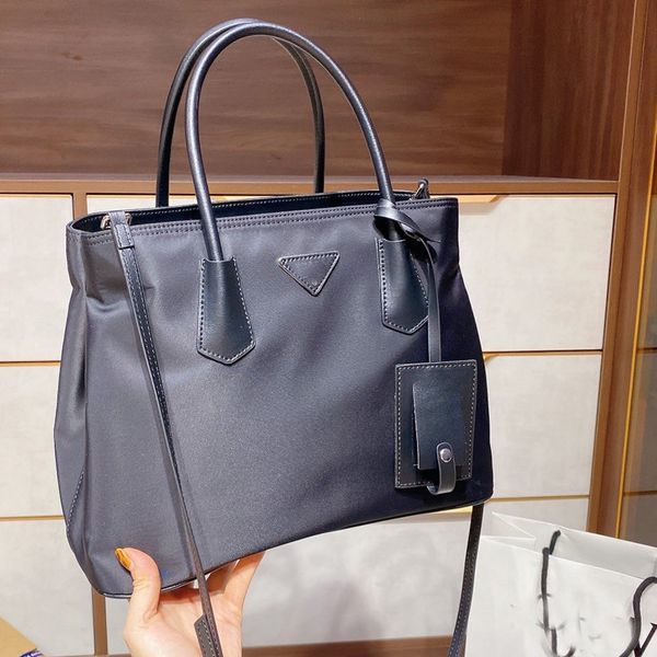 fashion shoulder bags nylon handbag purse simple design large capacity tote bag p letter lady package shopping bags work bags
fashion shoulder bags nylon handbag purse simple design large capacity tote bag p letter lady package shopping bags work bags