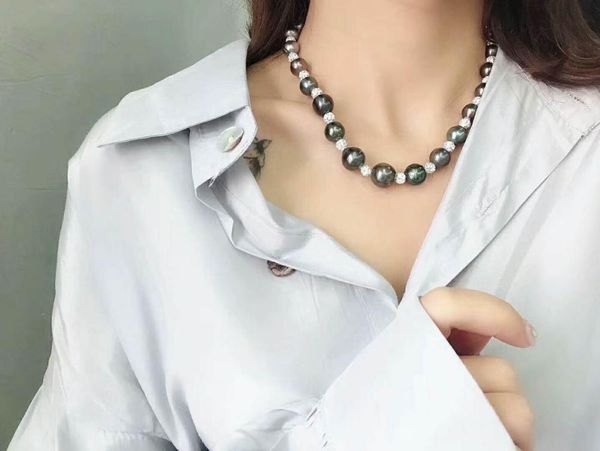 hand knotted noble 10-11mm black freshwater pearl micro inlay green zircon accessories necklace 48cm, Silver
hand knotted noble 10-11mm black freshwater pearl micro inlay green zircon accessories necklace 48cm, Silver