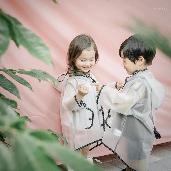 cute boy girl children hooded rainwear waterproofsilk eva transparent raincoat kids tassel hat clear rain coat outdoor rainwear1
cute boy girl children hooded rainwear waterproofsilk eva transparent raincoat kids tassel hat clear rain coat outdoor rainwear1