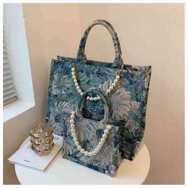 2022 factory wholesale summer tote commuter bag and korean monet garden printed fashion beaded portable shoulder bag
2022 factory wholesale summer tote commuter bag and korean monet garden printed fashion beaded portable shoulder bag