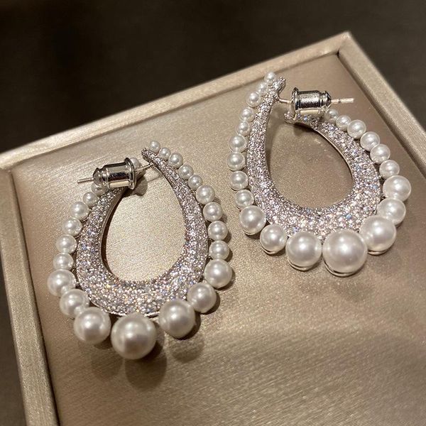 dangle & chandelier bilincolor silver color cz oval with white pearl special design earring for women
dangle & chandelier bilincolor silver color cz oval with white pearl special design earring for women
