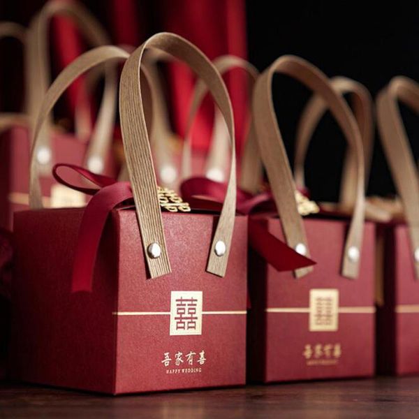 gift wrap 100pcs chinese elegant wedding candy box portable tote boxes for guest sweets favor paper with ribbon
gift wrap 100pcs chinese elegant wedding candy box portable tote boxes for guest sweets favor paper with ribbon