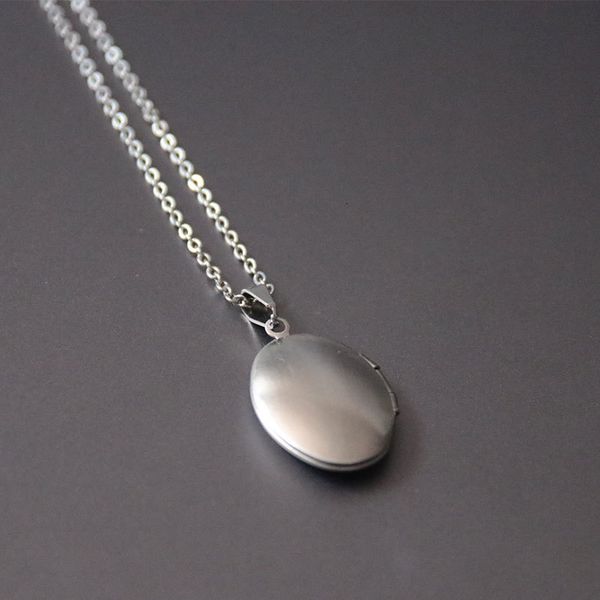 new cute oval shell p frame pendant necklace stainless steel charms locket necklaces women men fashion memorial jewe
new cute oval shell p frame pendant necklace stainless steel charms locket necklaces women men fashion memorial jewe