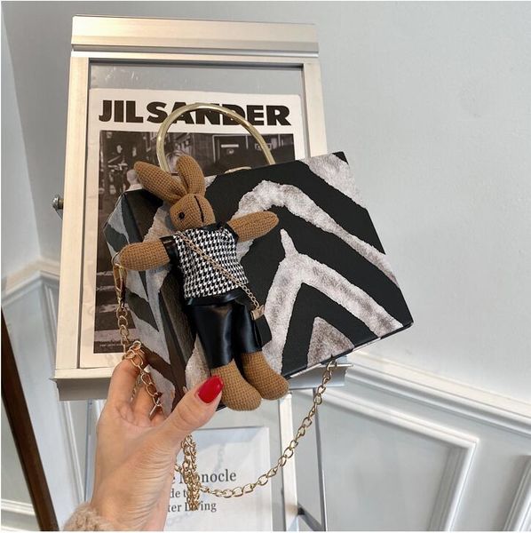 factory wholesale women handbag cute cartoon pendant women hard box chain bag new zebra leather handbag street trend leather shoulder bag, Black;red
factory wholesale women handbag cute cartoon pendant women hard box chain bag new zebra leather handbag street trend leather shoulder bag, Black;red