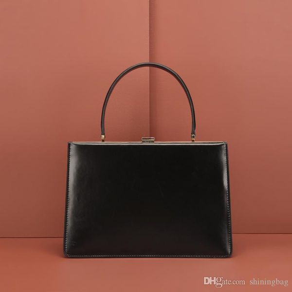 design leather bag ladies new fashion retro handbags european and american high-quality classic business briefcase 1002
design leather bag ladies new fashion retro handbags european and american high-quality classic business briefcase 1002