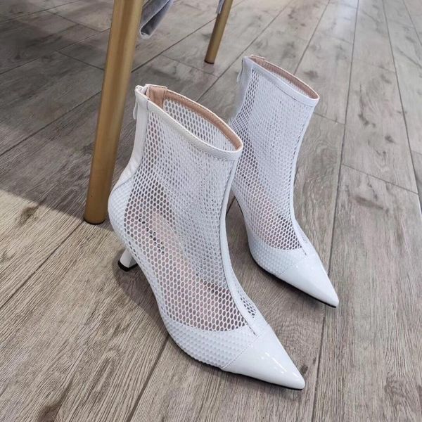lady fashionable female white bombs knitted black net dot high ankle heels short shoes 66bc
lady fashionable female white bombs knitted black net dot high ankle heels short shoes 66bc