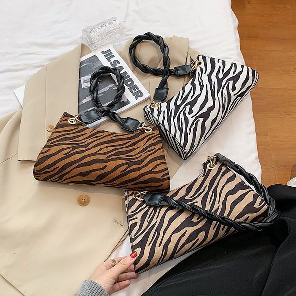 vintage zebra pattern women shoulder bag designer fashion ladies crossbody bags girls personality original purses halfmoon bag c1223
vintage zebra pattern women shoulder bag designer fashion ladies crossbody bags girls personality original purses halfmoon bag c1223