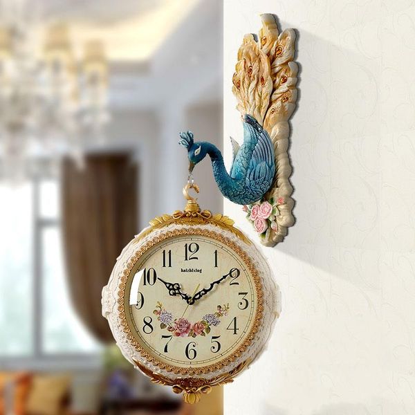 wall clocks european peacock double-sided clock living room creative fashion modern minimalist atmosphere
wall clocks european peacock double-sided clock living room creative fashion modern minimalist atmosphere