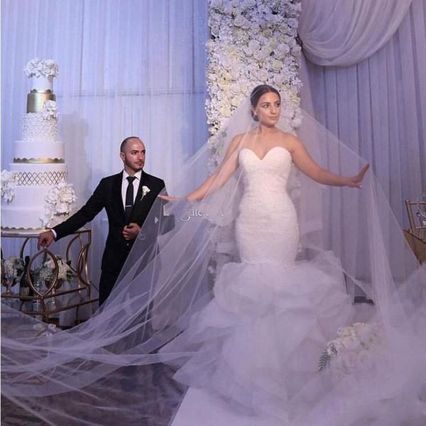 white lace mermaid wedding dresses sweetheart ruffles tiered organza skirt wedding gown sweep train arabic dubai bridal dress with appliqued
white lace mermaid wedding dresses sweetheart ruffles tiered organza skirt wedding gown sweep train arabic dubai bridal dress with appliqued