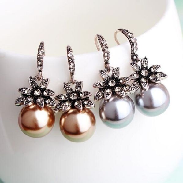 european and american retro fashion temperament luxury sun flower dazzling diamond pearl colored diamond earrings, Silver
european and american retro fashion temperament luxury sun flower dazzling diamond pearl colored diamond earrings, Silver