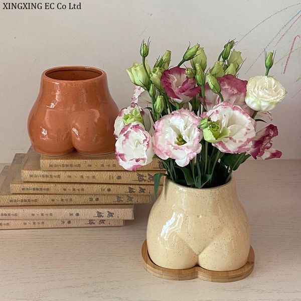 simple and modern ceramic countervase creative human body shape chest buwooden tray home bedroom plant pots decorative
simple and modern ceramic countervase creative human body shape chest buwooden tray home bedroom plant pots decorative