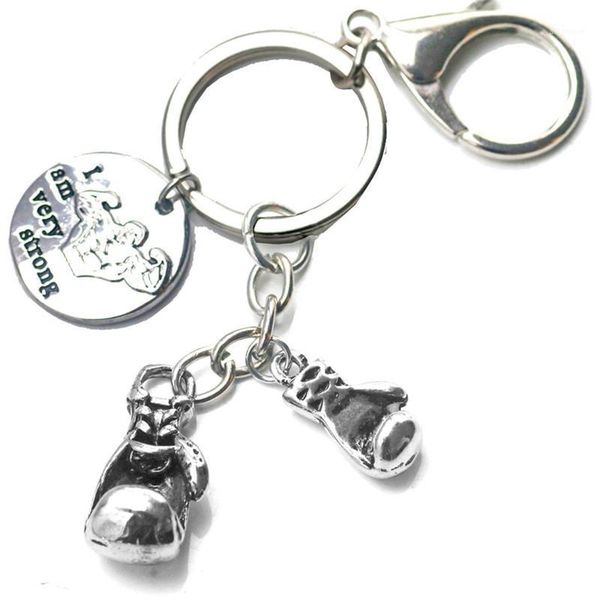 boxing glove keychain wallet fitness gym i am very strong charms key car purse bag buckle men sports hip hop jewelry1, Silver
boxing glove keychain wallet fitness gym i am very strong charms key car purse bag buckle men sports hip hop jewelry1, Silver